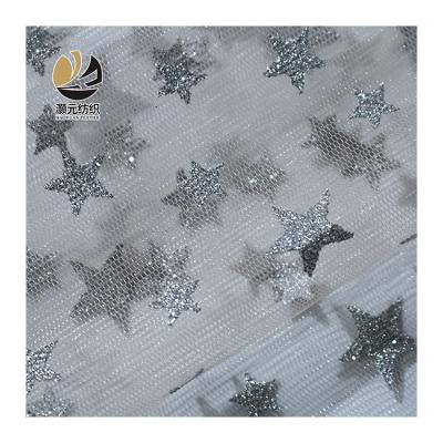 China Wholesale Cheap High Quality Silver Anti-static Glitter Star Tulle Fabric For Wedding Dress for sale