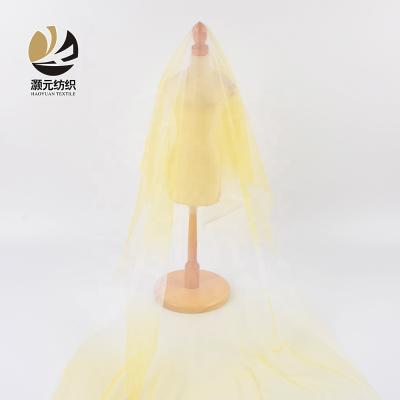 China Other High Quality Yellow Gradient Color Polyester Mosquito Netting Mesh Fabric For Kids Clothes for sale