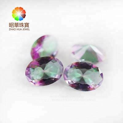 China Direct Synthetic Iridescence Oval / Iridescent Hot Glass Gemstone Factory Cut Mystical Glass Gems Stone for sale