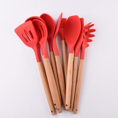 China Quick Sell Wooden Kitchenware Stocked Handle Silica Gel 9 Pieces Nonstick Cookware Scoop Spatula Set For Kitchen Supply for sale