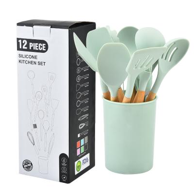 China Fashionable Wood Handle Stocked Silica Gel 12 Piece Cooking Kitchenware Stain Set Pan Shovel Spoon Kitchen Utensils Nonstick for sale