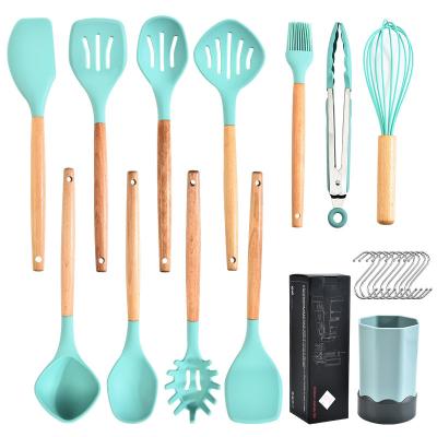 China Sustainable Beech Silicone Kitchenware 11 Piece Kitchen Cooking Spoon Spatula Silicone Handle Wooden Kitchenware with Storage Bucket for sale