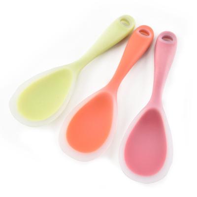 China Food Grade Popular Silicone Stocked One Piece Rice Spoon Ironing Soft Tableware for Kitchen Supply and Home Use for sale