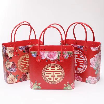 China Fashion PVC Holiday Candy Gift Shopping Baskets Leather Red Wedding Cosmetic Basket for sale