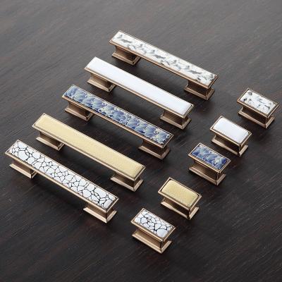 China Minimalist Knobs Drawer Pull Handles Buffet Door Handles Dresser Pulls White Antique Bronze Ceramic Decor CZ-2106 for sale