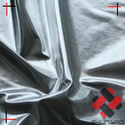 China Waterproof 100% Polyester Foil Coated Shiny Silver Glitter Fabric for sale