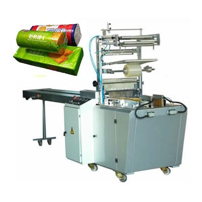 China X Fold Type Rijst / Taart / Koekjes Over Wrapping Verpakkingsmachine Te koop