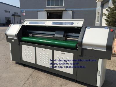 China Outdoor advertising hybrid UV printer with flat bed and 50mm printing heigh roll to roll printing fuction for sale