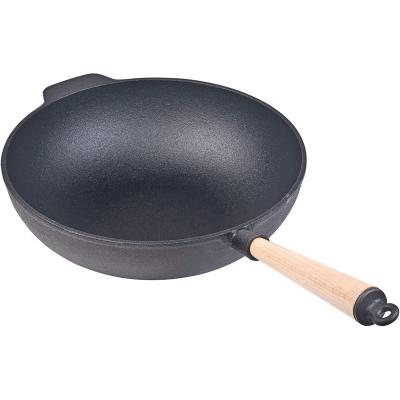 China Sustainable Cast Iron Wok Induction With Wooden Handle For Wholesale for sale