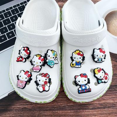 China Clog Charm 100pcs+HelloKitty Cartoon Sandals Charms Clog Decoration Fang Charms for Sandals and Bracelets Gifts for Kids for sale