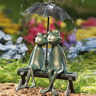 China Europe cast bronze statue of frog coulple sitting on bench under umbrella bronze garden figurine statue for sale