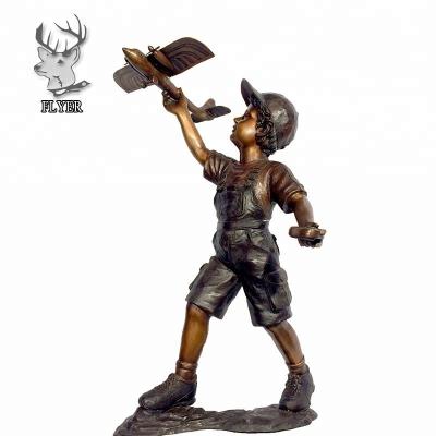 China Europe Metal Children Statue Casting Bronze Life Size Boy Playing Airplane for sale