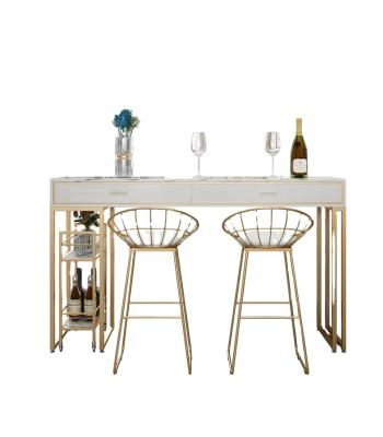 China Luxury Extendable Design Marble Dining Table Set With 2 Chairs White Modern Dining Tables With Drawers Gold Powder Marble Exterior Coating for sale