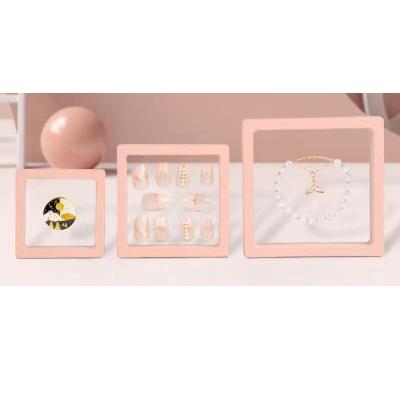 China 3d nail gift box eco-friendly floating tips display stand packaging with pet movie jewelry stones display case custom logo for sale