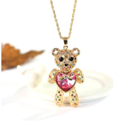 China Trendy Sweater Necklaces Vintage Heart Crystal Gold Teddy Bear Necklace Pink Birthday Gift For Girlfriend for sale