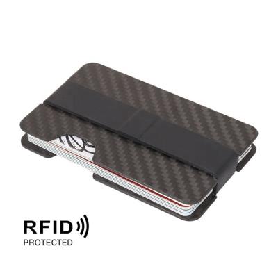 China Credit Card Carbon Fiber Mini Thin Money Clip Credit Card Sleeve ID Holder RFID Anti-thief Card Wallet Case With Elastic Band for sale