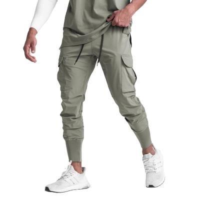 China Hot Sale Men's Casual Fitness Anti-Wrinkle Sweatpants Breathable Quick-Dry Gym Custom Cargo Loose Jogger Panties for sale