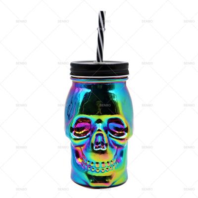 China Steamable Halloween Rainbow Holographic Iridescent Glass Skull Mason Jar For Drinks Sipper 16oz With Lid And Straw for sale