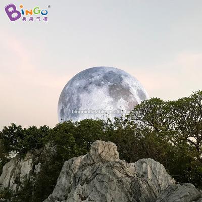 China Handmade Big Inflatable Event Planets Toys 8x8mH PVC Moon Balls For Outdoor Decoration for sale