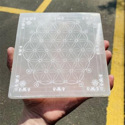 China Dong Hai Wholesale Polished Natural Carved Pattern Square Selenite Panel Slices Crystal Slab Energy Disc Pad for sale