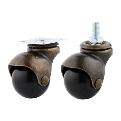 China 1.5 other two inch antique copper spiral ball wheel universal furniture casters, pole insert chair wheels, spherical sofa wheels for sale