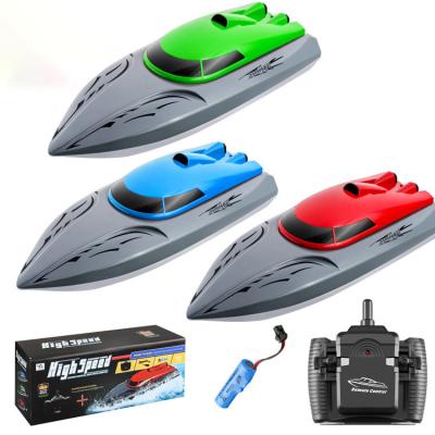 China 2.4G remote control ship charging electric high-speed yacht upgrade charging children's competition boat summer water toys for sale