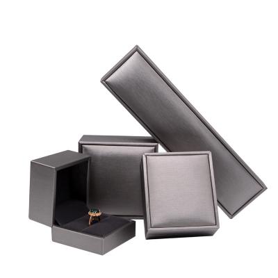 China Fashionable And Simple Custom Hot Morocco Paper Ring Jewelry Storage Boxes Black For Jewelery Packaging Box PU Leather Faux Leather Leatehr for sale