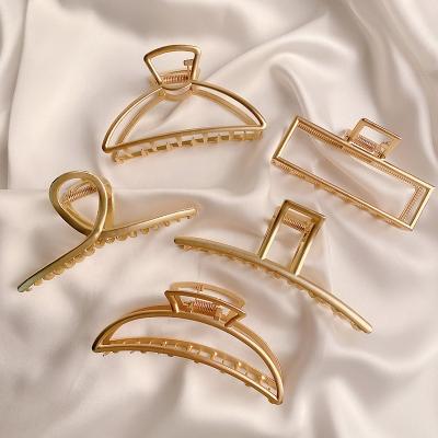 China Elegant Fashion Central Statistical Institute of Korea Ladies Hair Accessories Metal Hair Claw Clip Crossed Design Gold Color Luxury Hair Clips for sale