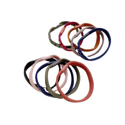 China Fashion Letter Leather Band Korean Printed Cheap Promotional Styles/Various Simple Hair Tie High Standard for sale