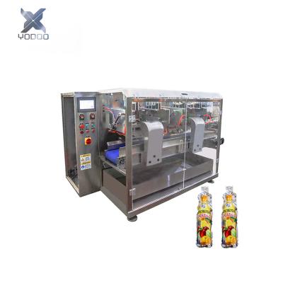 China Food Soft Drink Full Automatic Pouch Sealing Filling Machine With 4 Nozzles Liquid Carbonated Juice Drink Filling Machine for sale