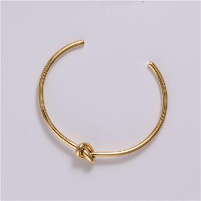 China Fashion Waterproof Women Wholesale Jewelry Bracelets High End Gold Plated Stainless Steel Knot Cuff Bracelet for sale