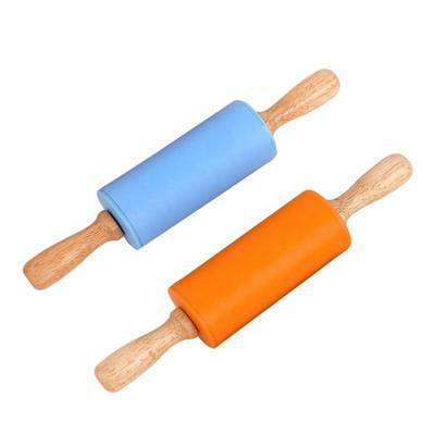 China Outdoor Wooden Handle Stocked Pin Stick Non Large and Kids Mini Silicone Dough Rollers for sale