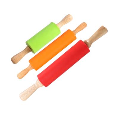 China Home Stocked Kitchen Kids Cake Dough Wooden Handle Non-Stick Silicone Baking and Rolling Pin for sale