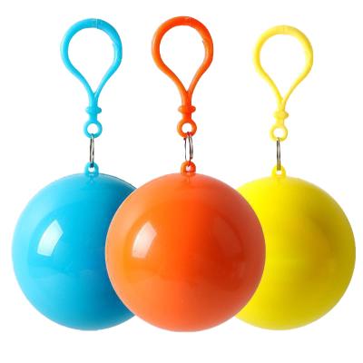 China Muilt-color Spherical Raincoat Travel Carrying Plastic Easy Hook Poncho Ball Disposable Raincoat Ball for sale