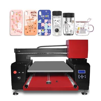 China Hotels Logo Printer A1 Cylinder Bottle Printer 6090 Printing Machine Digital Glass Pen With Varnish Gloss Banner UV Leather for sale