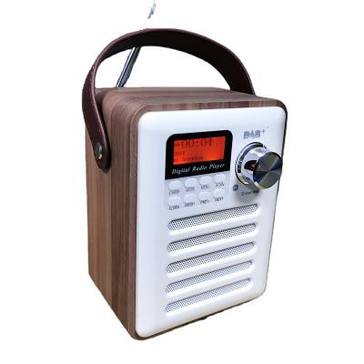 China Retro DAB/FM BT/TF card/U-disk MP3 radio wooden speaker with handle, (BT) U-disk/SD card wireless play, rechargeable battery, good sound quality for sale