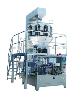 China Food Dried Fruit Filling Granular Filling Machine and Seed Candy Premade Bag Packing Machine Sachet Rotary Sealer for sale