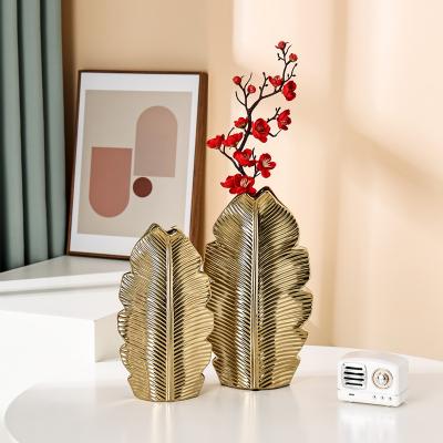 China Luxury Morden Ceramic Feather Shape Modern Flower Vase Gold Flower Vase Home Decorative On Sale for sale