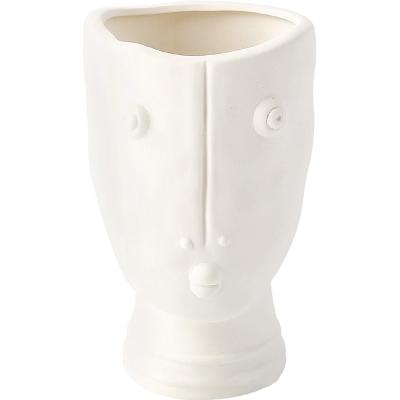 China Flowerpot modern minimalist white ceramic creative personality face abstract vase for home decor for sale