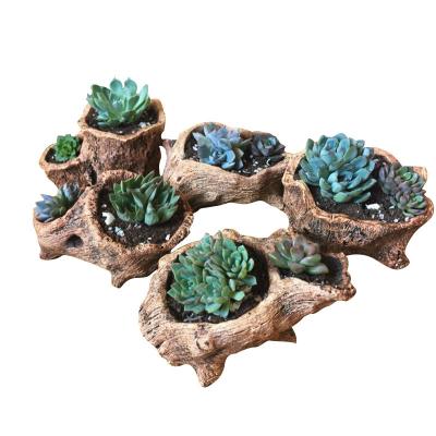 China Creative CLASSIC Cement Tree Root Carving Mini Flowerpot Succulents Basin Flower Planter Stump Flower Pot for sale