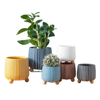 China Wholesale price CLASSIC decoration modern creative design three legs wooden striped small ceramic flower pots for sale