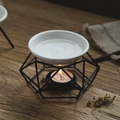 China Modern Wholesale Exquisite Candle Heater Metal Nest Shape Ceramic Censer For Home Dector for sale