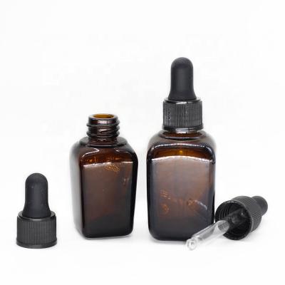 China Personal Care Wholesale Oil Glass Bottles 15ml 30ml 50ml Essential Amber Square Glass Bottle for sale