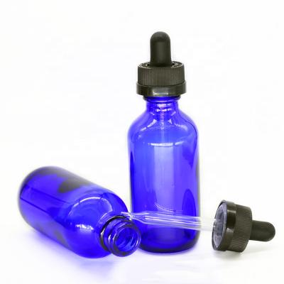 China Hot Sale 60ml Boston Environmental Bottle 2oz Blue Round Glass Bottles With Child Safe Glass Dropper for sale