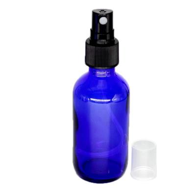 China Cobalt Blue Personal Care 60 Ml Empty Essential Oil Glass Spray Bottle With Mist Spray Cap For Cosmetic Perfume for sale