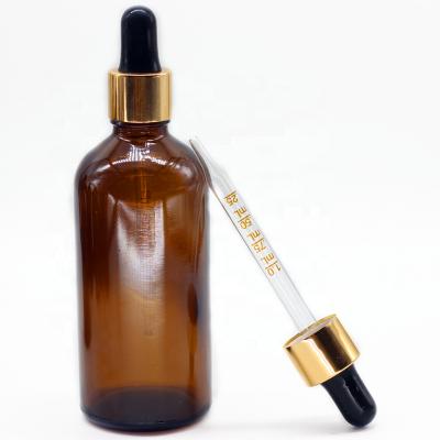 China 100ml amber euro glass pharmaceutical dropper bottle with gold aluminum glass dropper with food grade glass pipette for sale