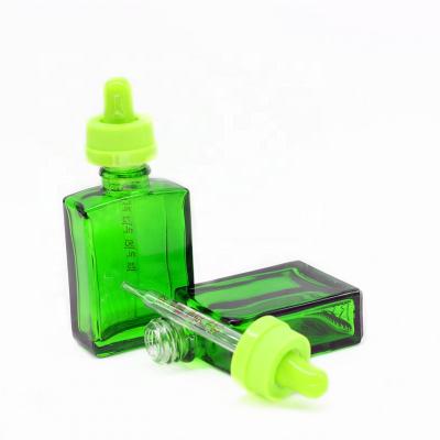 China Green Glass Bottles 30ml Rectangle Personal Care Flat Square Glass Dropper Bottle for sale