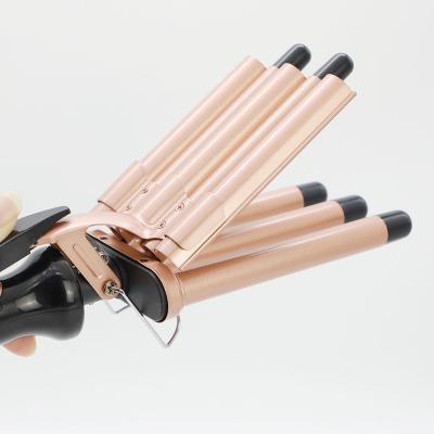 China Auto Rotating Hair Curling Iron Fashion Five Barrel Ceramic Hair Curler LCD Display Show Big Wave Fast Heating Automatic Hair Curler for sale