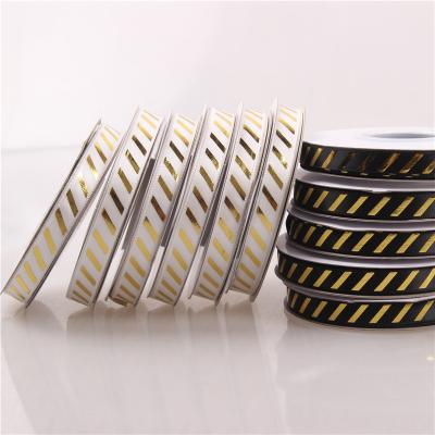 China Wholesale 1X22.5M Custom Logo Polyester Gift Box Twill Ribbon Hot Stamping Iridescent Hot Stamping Silver Ribbon With Flat Stripes for sale