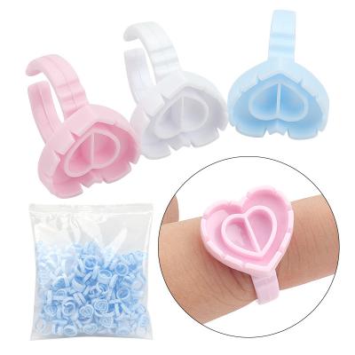 China Fashion Factory OEM Eyelash Extension Cups Rings Heart Shape Glue Holder Fast Flower Blooming Eye Lash Makeup Tools for sale